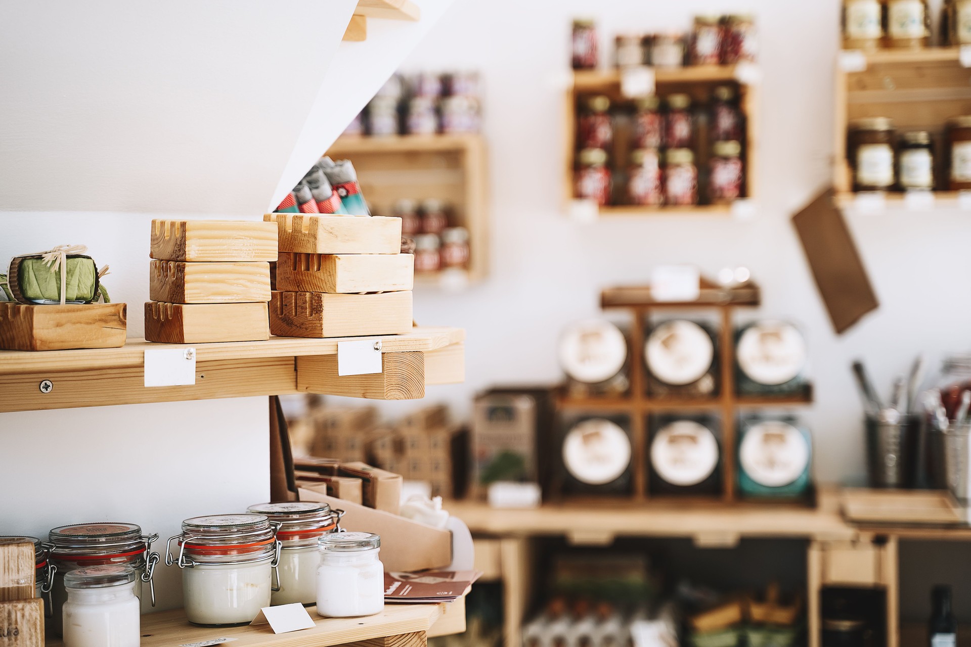 Different food goods and personal hygiene or cosmetics products in zero waste shop. Plastic free grocery store.